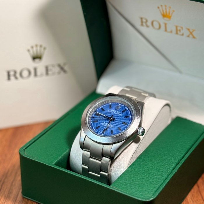 Montre Rolex cadran bleu